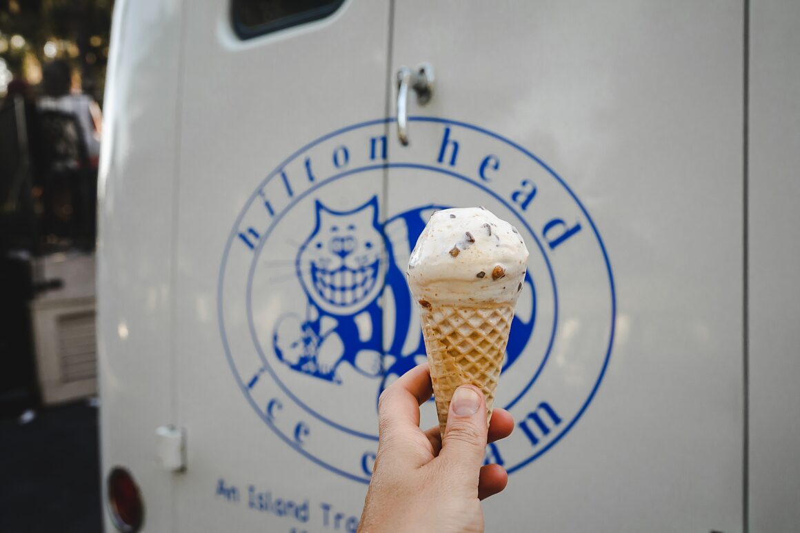 Ice cream cone being held in front of a hilton head ice cream truck. Article on 7 Tips for Running in High Humidity Weather.